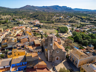 Fototapeta na wymiar Envision a journey through medieval Spain as drone imagery unveils the treasures of Garriguella against the backdrop of Costa Brava. 