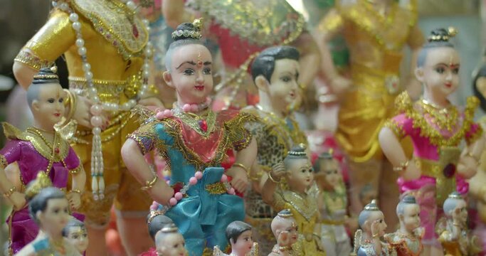 Golden boy doll thai in tample.Golden Boy is called "Kuman Thong". Ceramic dolls of children.