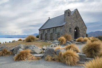 The famous iconic landmark scene of Church of the Good Shepherd, the smallest church in this country and attracting many tourists to visit every years, Lake Tekapo, New Zealand.