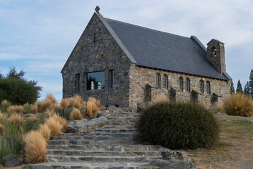 Church of the Good Shepherd at the backside. It's the smallest church in this country and attracting many tourists to visit every years, Lake Tekapo, New Zealand.