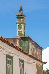 Fototapeta na wymiar Portuguese chimneys, special seen in the little villages and meaning is to show how rich people are, how more chimneys they have on their roof. 