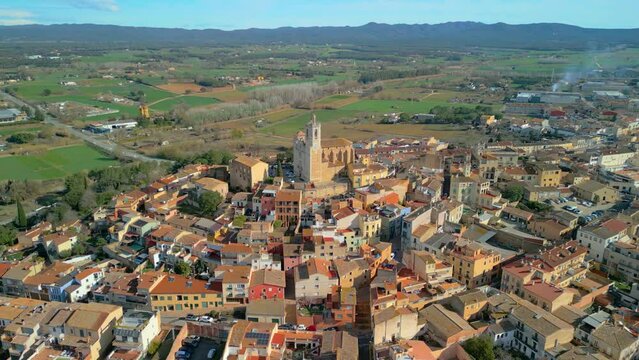 Explore the medieval charm of Llagostera from above with breathtaking aerial images showcasing Costa Brava's beauty.
