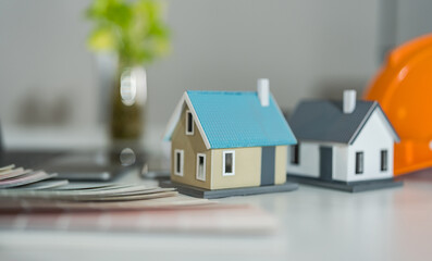 Obraz na płótnie Canvas Real estate planning concept with miniature houses