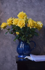 The beautiful yellow flowers on the grey background