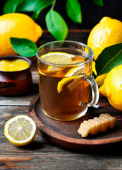 cup of tea with ginger and lemon. Selective focus.