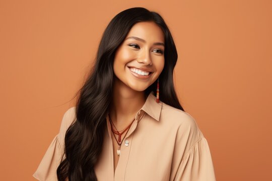 Studio Shot Portrait of a Smiling Young Native American Woman 
