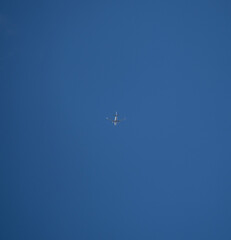 Wings of Freedom: Aircraft Soaring Through the Azure Sky