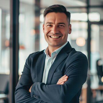 Portrait of a European businessman 40 years against the background of an office