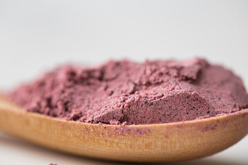 Close up view of organic freeze dried black currant powder