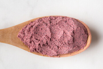 Close up view of organic freeze dried black currant powder
