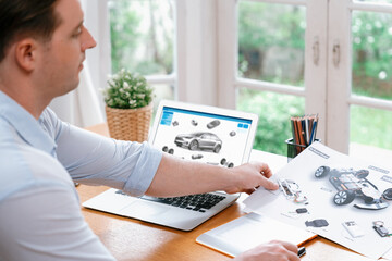 Car design engineer analyze car prototype for automobile business at home office. Automotive...