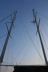 A sailboat with two tall mast poles