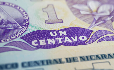 Fototapeta premium Closeup of old Nicaragua Centavos currency banknote of national bank (focus on center)