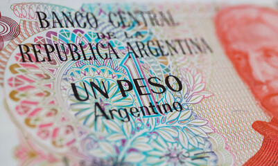 Closeup of Argentina one Peso old currency banknote of central bank (focus on center)