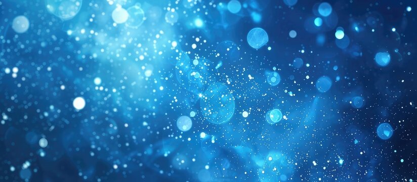 This blurry blue background sets a festive tone with its soft focus and deep blue hues. Perfect for adding a touch of holiday cheer to any design project.
