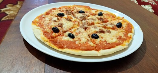 pizza on a wooden board