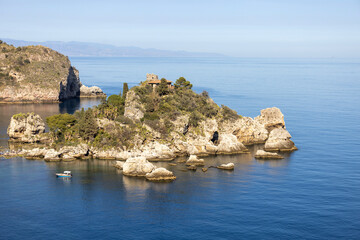 Fototapeta na wymiar Beautiful view of the picturesque Isola Bella, small rocky island in the Ionian Sea, Taormina, Sicily, Italy