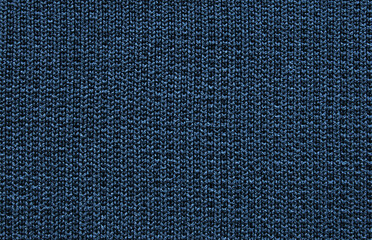 Soft dark blue color ribbed jersey fabric pattern close up as background
