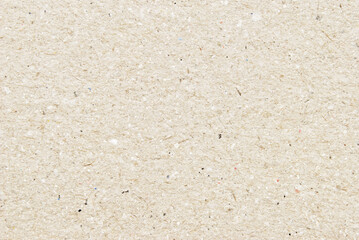 A sheet of beige recycled craft paper texture as background