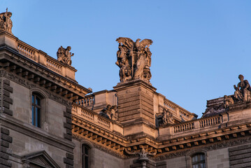 Paris, France - Dec. 26 2022: The décorative roof part of Louvre Palace Museum  in Paris