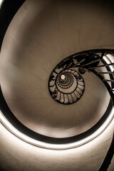 Paris, France - Dec. 28 2022: The spiral stairways in the Arc de Triomph in Paris