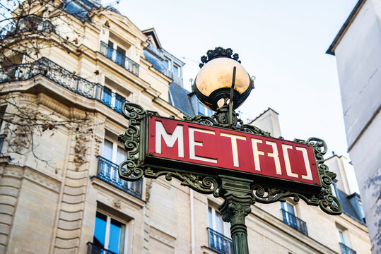Paris, France - Dec. 27 2022: Parisien metro sign in downtown Paris
