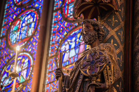 Paris, France - Dec. 27 2022: The stunning stained glass window and the beautiful ceiling in Saint-Chapelle in Paris