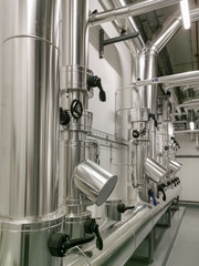 Industrial system with stainless steel ducts, forced ventilation of buildings and industrial equipment, large metallic ducts for air inlet and outlet, air renewal, industrial HVAC system