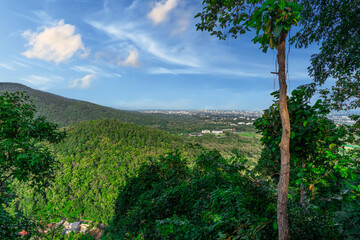 Panorama view of Chiangmai Chiang Mai city taken from Doi Suthep Mountains. Lovely views of the Old city at Sunset Sunrise lovely tropical mountains and beautiful nature in the foreground