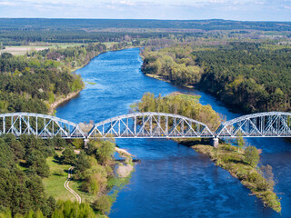 Obraz na płótnie Canvas Railway bridge over the Bug river, aerial landscape
