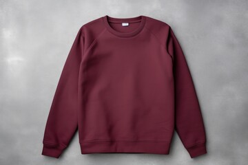 Burgundy blank sweater without folds flat lay isolated on gray modern seamless background