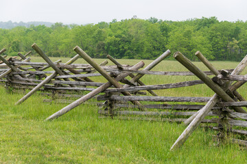 Stacked wooden fence on the edge of the Gettysburg battlefield, site of the bloodiest battle of the Civil War - obrazy, fototapety, plakaty