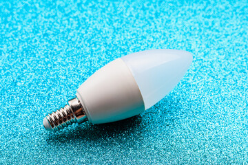 Energy saving light bulb. Background with selective focus and copy space