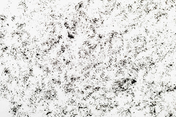 Chaotic traces of black paint on a white paper canvas. Blank for design, graphic resource