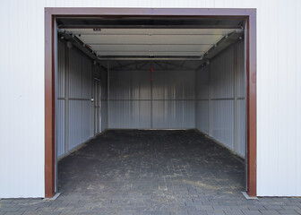 Entry to iron empty car garage, automatic lift gate shutter gate, Film grain effect
