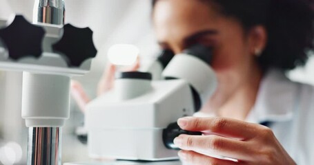 Woman, scientist and forensic examination with microscope for science, microbiology or discovery at lab. Closeup of person or researcher looking in scope or lens for scientific breakthrough or test