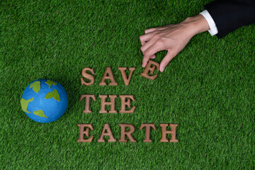 Eco awareness campaign for Earth day concept showcase message arranged in Save Earth on biophilic...
