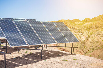 Close-up of solar panels installed in the desert to provide electricity to a remote meteorological base