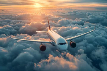 Fototapeten Commercial airplane jetliner flying above dramatic clouds © Тамара Печеная