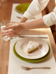 Romantic Dinner at Home Woman Smiling over a Delicious Meal on the Dining Table