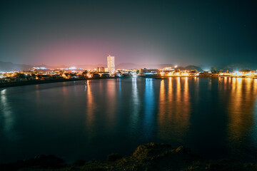 Obraz premium Beautiful night view from the Cabezo del Gavilán viewpoint to La Reya beach in Puerto de Mazarrón, Region of Murcia, Spain
