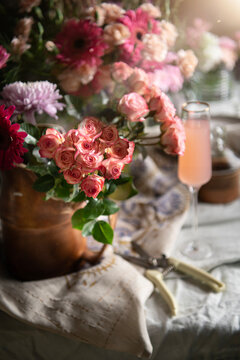 Pink drink, flowers and candles 