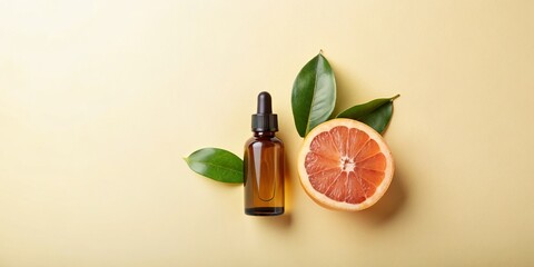 Bottle with Grapefruit Essential Oil, Leaf, and Pie: Ideal for Aromatherapy, Natural Beauty Products, and Culinary Concepts.