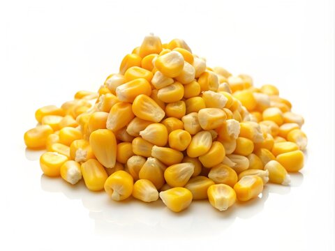 Fresh corn kernels scattered on a clean white background, creating a simple yet visually appealing image.