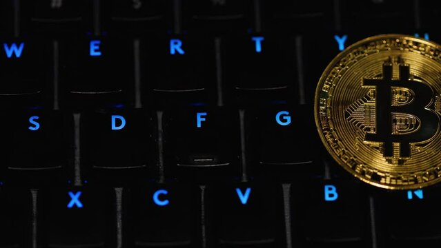 Bitcoin crypto currency on colorful keyboard 1