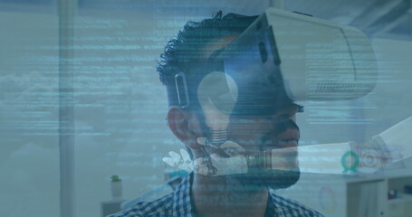 Digital composite image of data processing over robotic hands against man using vr headset at office