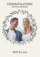 Celebrating love and union, a joyous couple framed by a delicate wreath symbolizes new beginnings