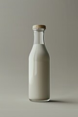 Fresh milk in a bottle on grey background. Kefir. World milk day. Fresh milk transformed into kefir, a delight on this special day.
