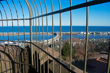 Bridge on Route 36, New Jersey, connecting the Atlantic Highlands with Sandy Hook and Sea Bright in New Jersey, USA, viewed through the railing on the north tower of the Navesink Twin Lights -08