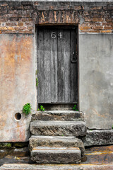 old wooden door in wall